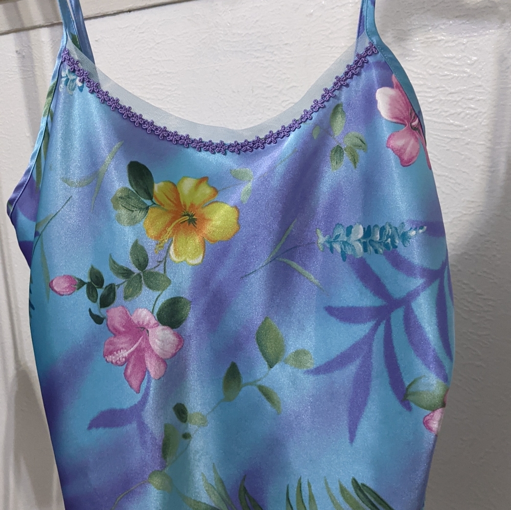 Fun, silky, flower top with lace at the top